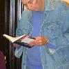 Kenneth Bernard reading one of his essays; Grinnell Centennial Party, October 17, 2010 (Photo: Lynne Van Auken)