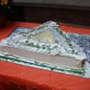 The "Centennial Cake" in The Grinnell's unmistakable triangular shape; Grinnell Centennial Party, October 17, 2010.

(Photo: Matthew Spady)
